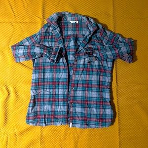 Woolrich flannel. Size large fits like a medium.